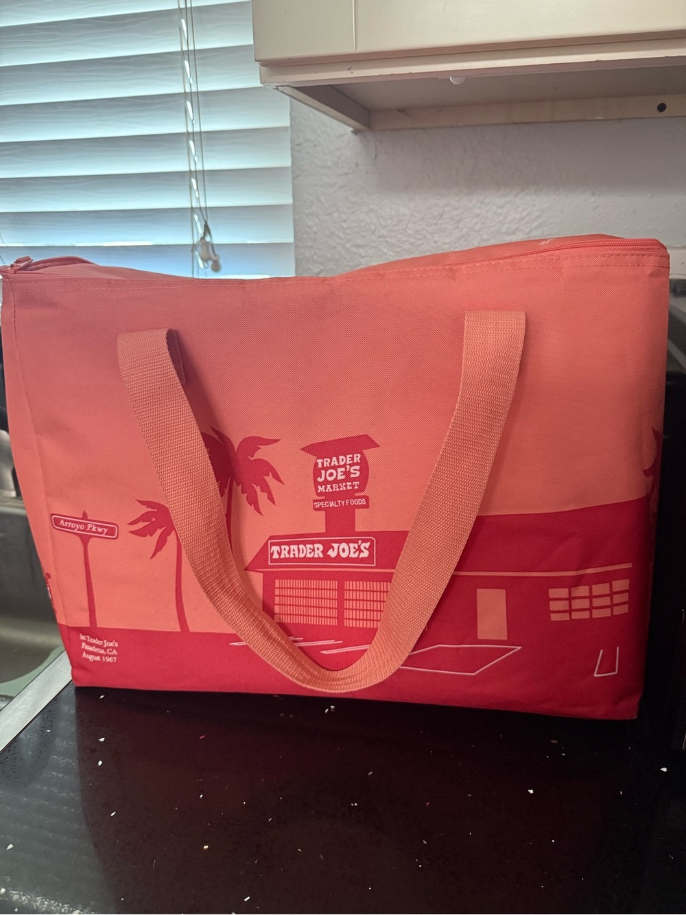 2 Totes. Trader Joe's Coral Reusable Tote and Large Tote Black and Red.